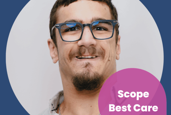 A man named Jacob Matthew is smiling. He is wearing glasses.