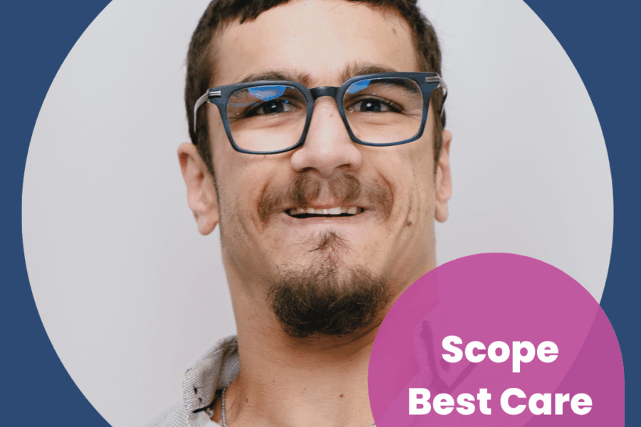 A man named Jacob Matthew is smiling. He is wearing glasses.